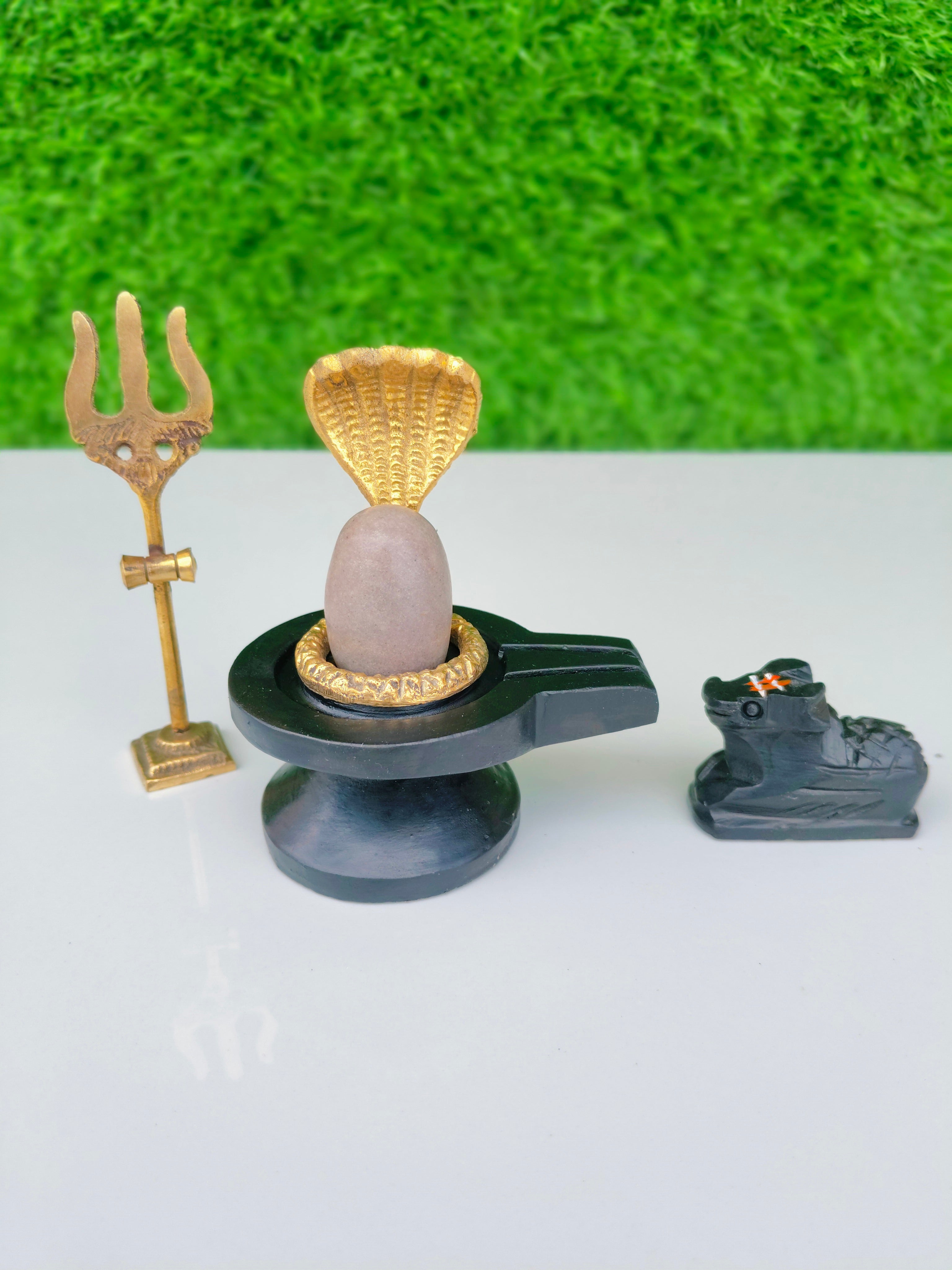 Narmdeswar shivling jaladhari naag nandi trishul